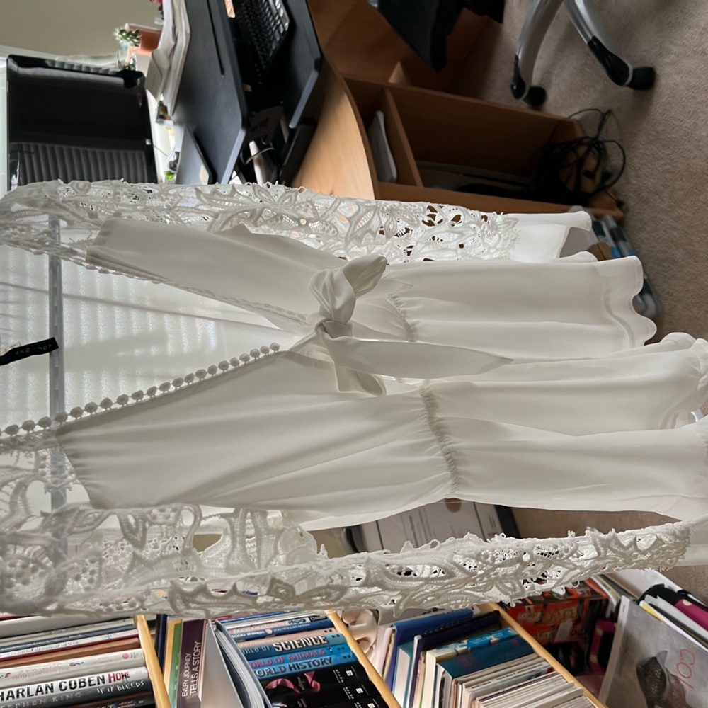 White romper. Size small